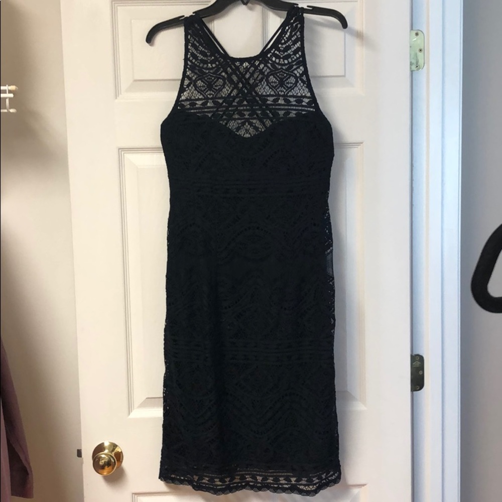 Navy blue lace, knee length cocktail dress.